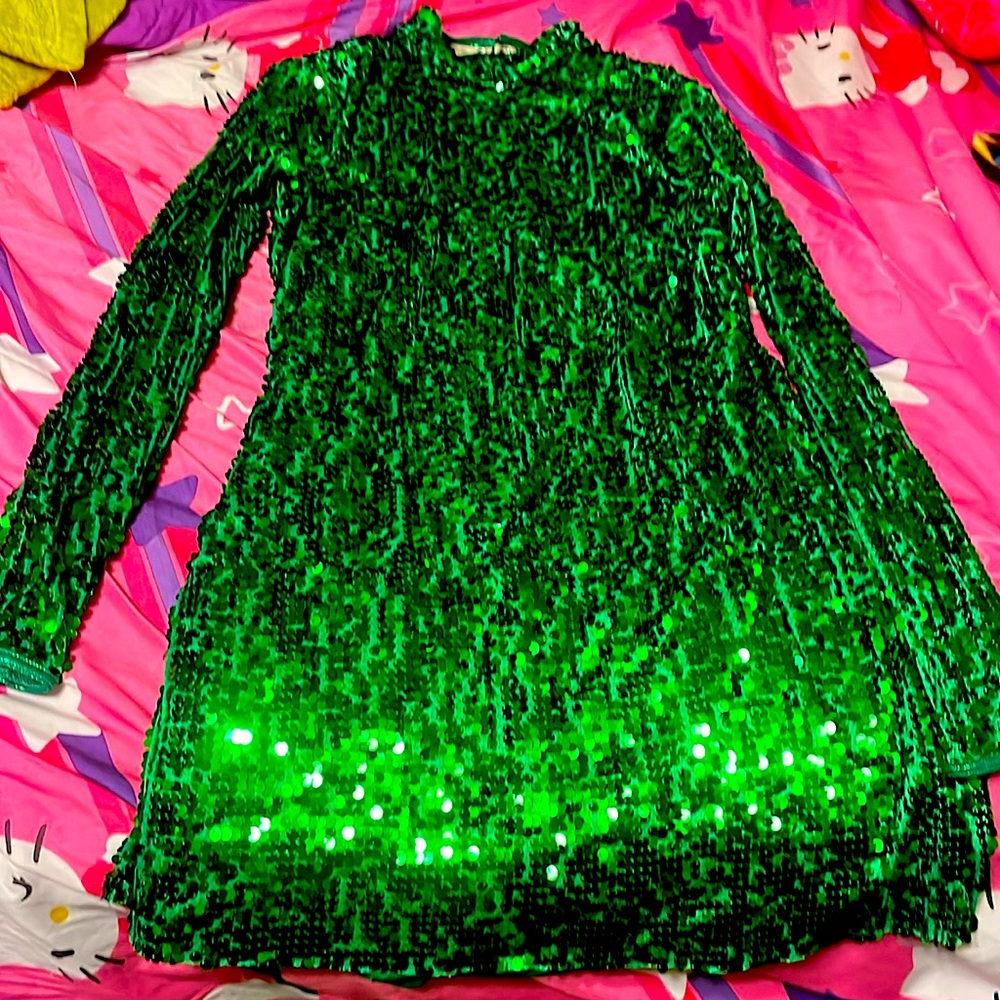 Green sequin dress. With tummy control.